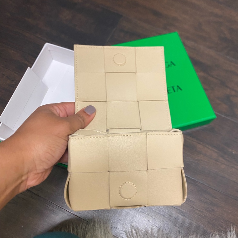 small cream purse